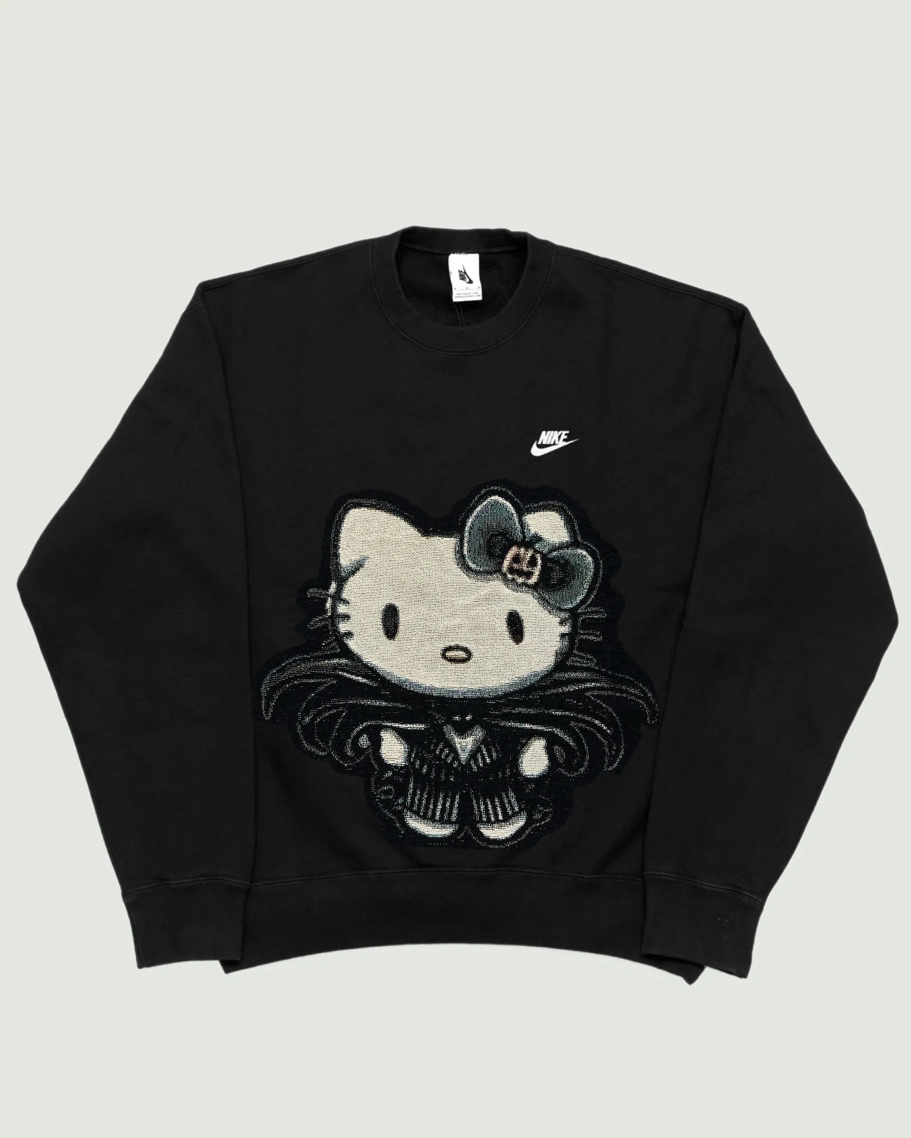 VA-AW23-685 HELLO KITTY X NIGHTMARE BEFORE CHRISTMAS NIKE RETRO REWORK CREWNECK